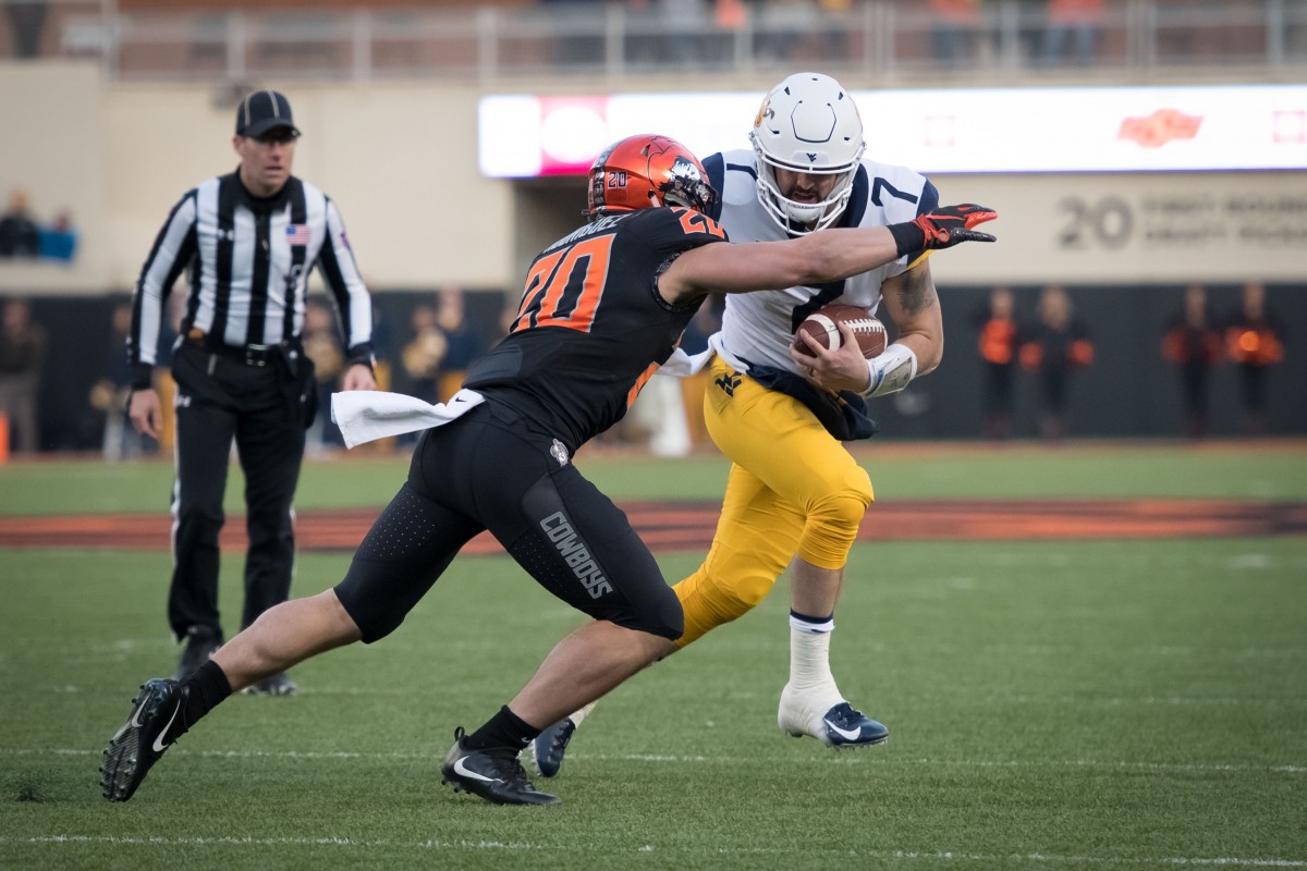 Looking back, Will Grier's fumble changes course of game vs. Oklahoma State